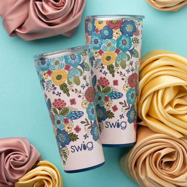 Swig Life Insulated Bella Rosa 32oz and 22oz Tumbler with silk roses on a blue background