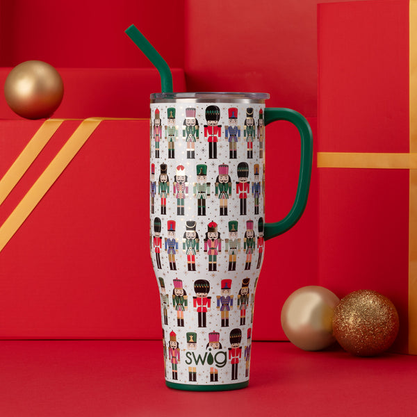 Swig Life 40oz Classic Nutcracker Insulated Mega Mug on a red holiday background