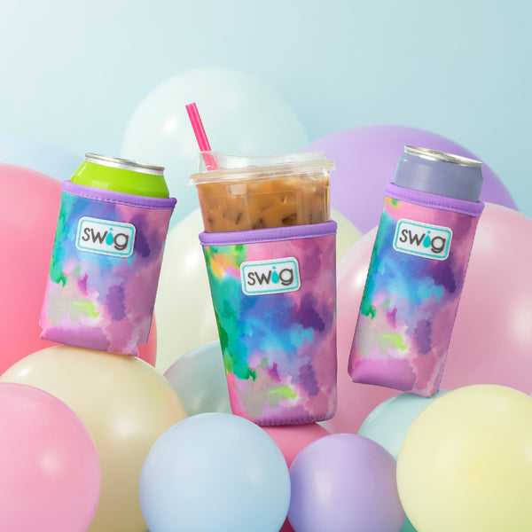 Swig Life Neoprene Cloud Nine Iced Cup Coolie, Can Coolie, and Slim Can Coolie on a background of colorful balloons