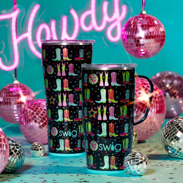 Swig Life Insulated Disco Cowgirl 32oz Tumbler and 22oz Travel Mug on a blue background with "Howdy" neon sign