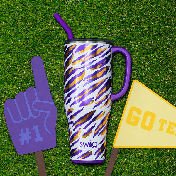 Swig Life 40oz Geaux Gameday Mega Mug on a green grassy background