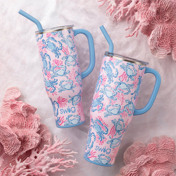 Swig Life Insulated Get Crackin' 40oz Mega Mug and 30oz Mega Mug on a pink coral background