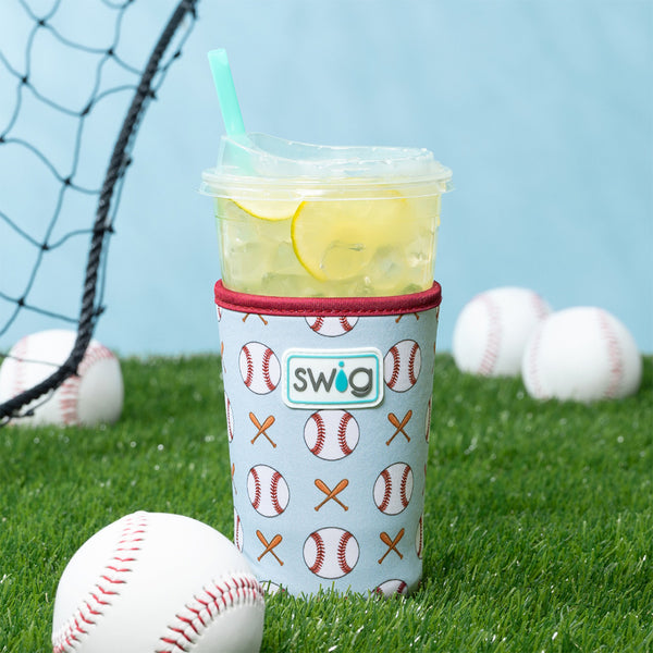 Swig Life Home Run Iced Cup Coolie on a baseball field