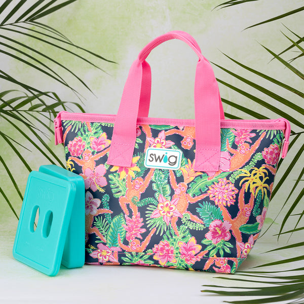 Swig Life Jungle Gym Insulated Lunchi Lunch Bag with two aqua Ice Packs on a leafy plant background