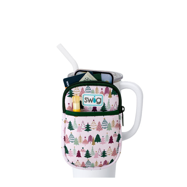 Swig Life Tinseled Trees Neoprene Mega Mug Pouch with two pockets containing daily essentials