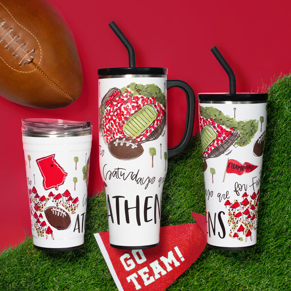 Swig Life Insulated Saturdays in Athens Drinkware collection on a sports field background