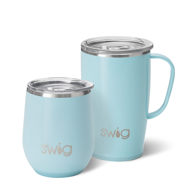 Swig Life Shimmer Aquamarine AM+PM Set including a 22oz Travel Mug and a 32oz Tumbler in front of a red paper fan