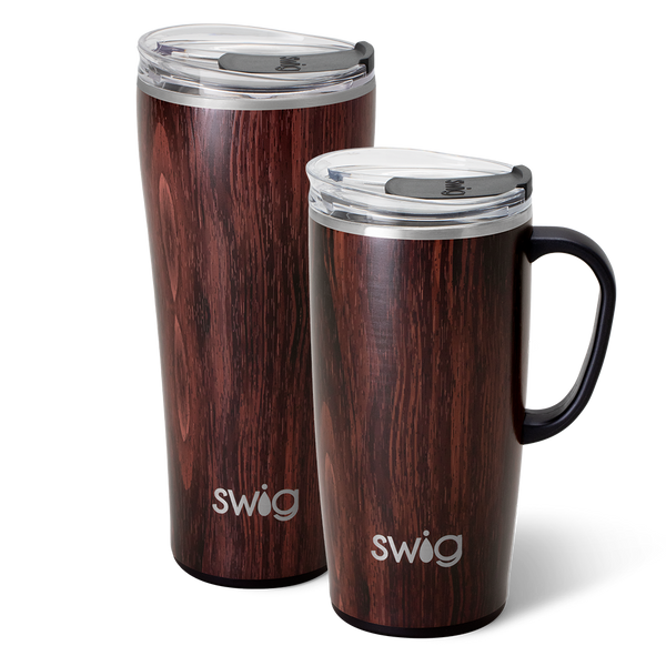 Swig Life Bourbon Barrel XL Set including a 22oz Travel Mug and a 32oz Tumbler in front of a red paper fan