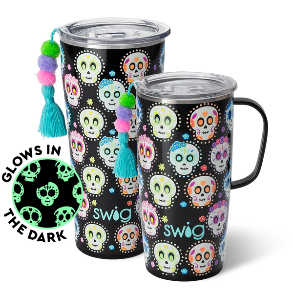 Swig Life Sugar Skulls XL Set including a 22oz Travel Mug and a 32oz Tumbler in front of a red paper fan